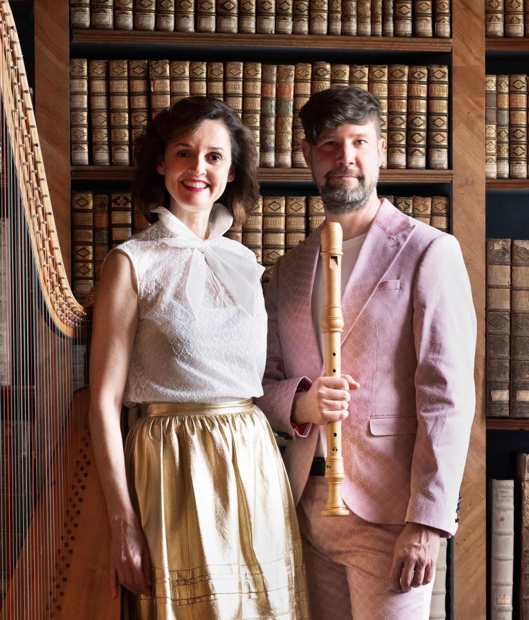 Harfenistin neben einem Flötisten